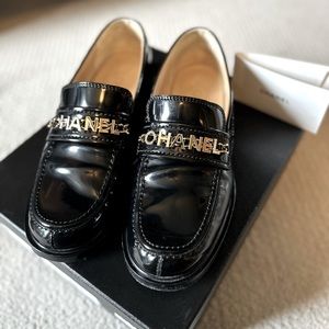 Black Patent Chanel Loafers.